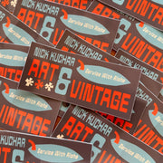 Stack of 'Nick Kuchar Art & Vintage' stickers with colorful text and graphics.