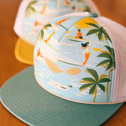 yellow and teal foam trucker hat with surfer and hawaii art