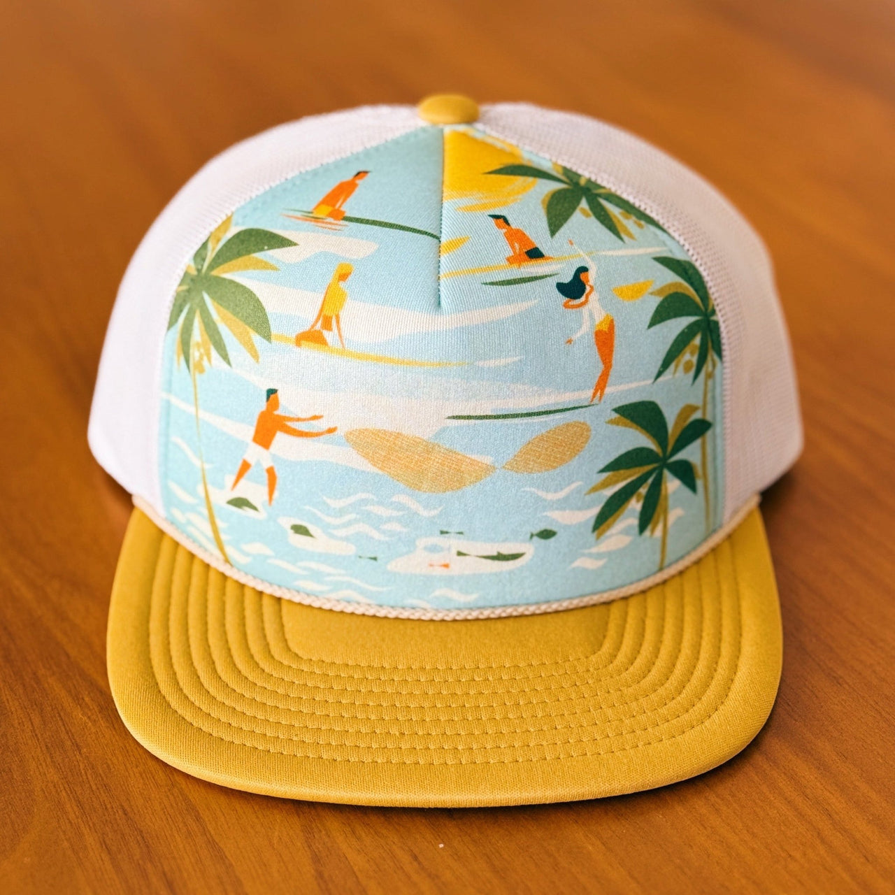 yellow foam trucker hat with surfer and hawaii art