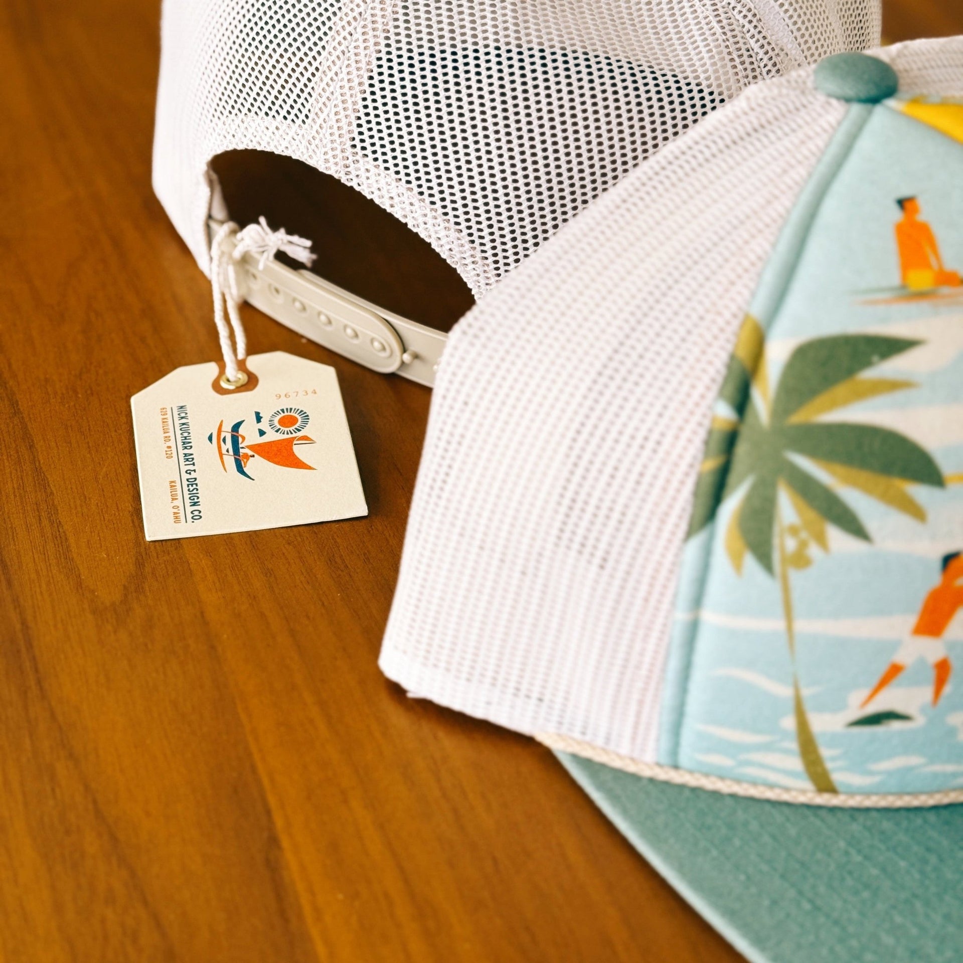 yellow and teal foam trucker hat with surfer and hawaii art