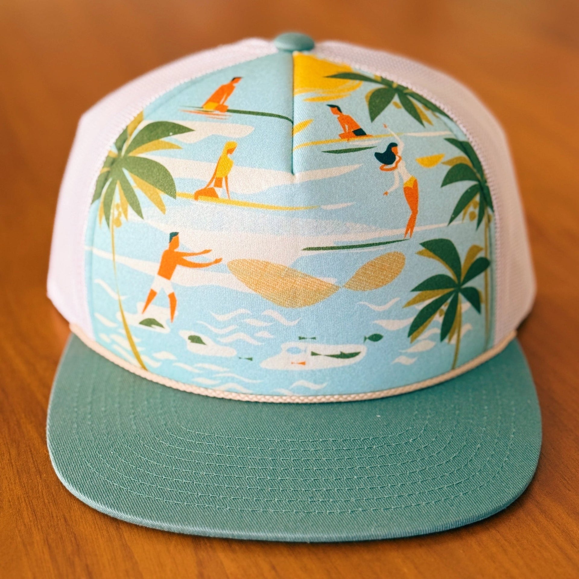 teal foam trucker hat with surfer and hawaii art