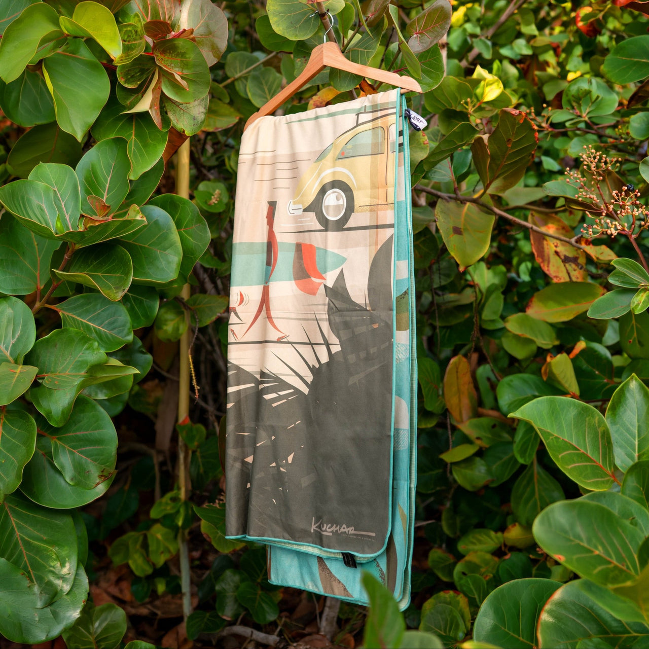 Microfiber beach towel hanging on a beach in hawaii